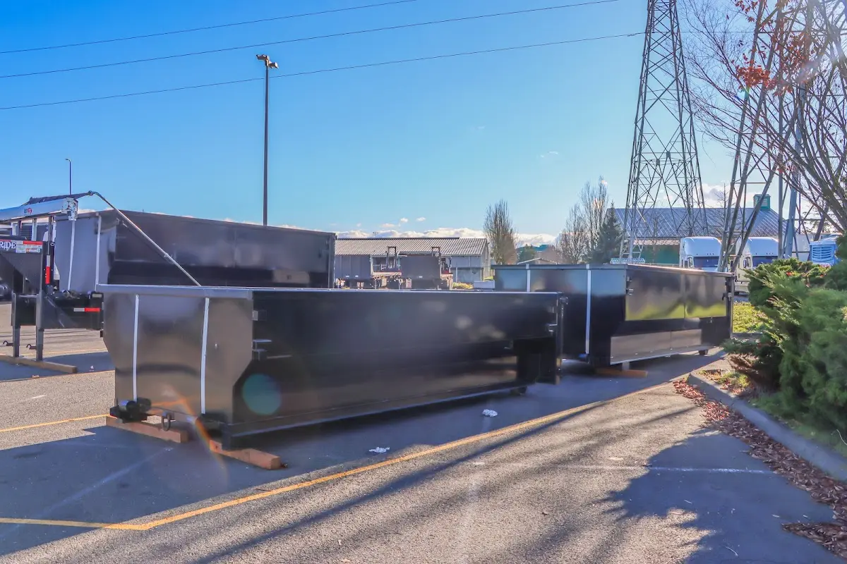 Roll-off dumpster ready for waste disposal at job site for Demolition Dumpster Rental in Altoona